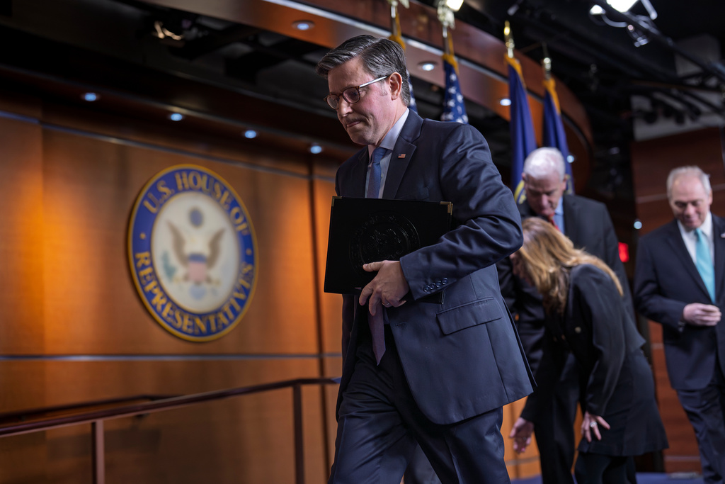 Speaker of the House Mike Johnson, R-La., leaves a news conference as Republicans struggle with a plan to address growing health care costs, at the Capitol in Washington, Tuesday, Dec. 16, 2025. (AP Photo/J. Scott Applewhite)