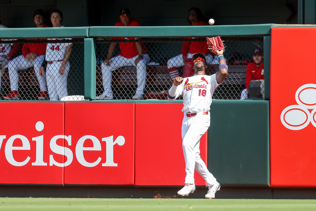 St. Louis Cardinals' Jordan Walker catches a fly ball for an out against Washington Nationals' Andrés Chaparro during the fifth inning of a baseball game Sunday, Sept. 20, 2026, in St. Louis. (AP Photo/Scott Kane)