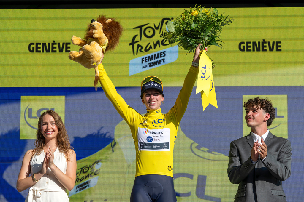 Netherlands' Lorena Wiebes of team SD Worx Protime celebrates on the podium with the yellow jersey after the second stage a 149 km from Aigle to Geneva during the Women's Tour de France (Tour de France Femmes), in Geneva, Switzerland, Sunday, Aug. 2, 2026. (Jean-Christophe Bott/Keystone via AP)