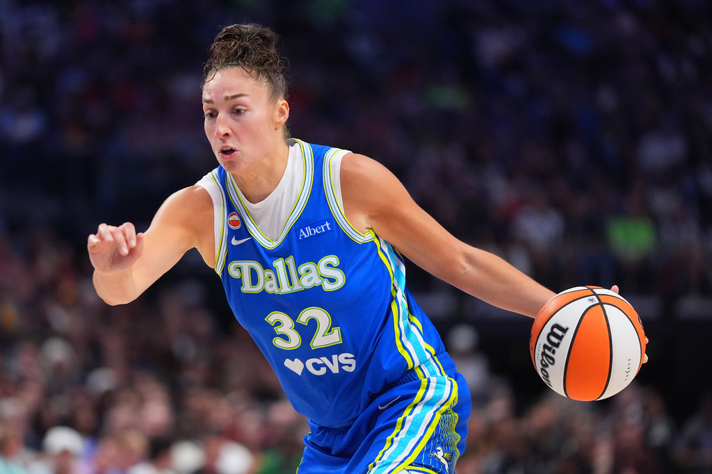 Dallas Wings forward Jessica Shepard drives with the ball during the first half of a WNBA basketball game against the Indiana Fever in Dallas, Thursday, Aug. 20, 2026. (AP Photo/LM Otero)