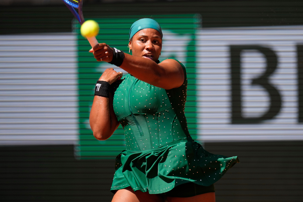 Taylor Townsend of the U.S. returns to Coco Gauff of the U.S. during their first round women's singles tennis match at the French Open tennis tournament in Paris, Tuesday, May 26, 2026. (AP Photo/Christophe Ena)