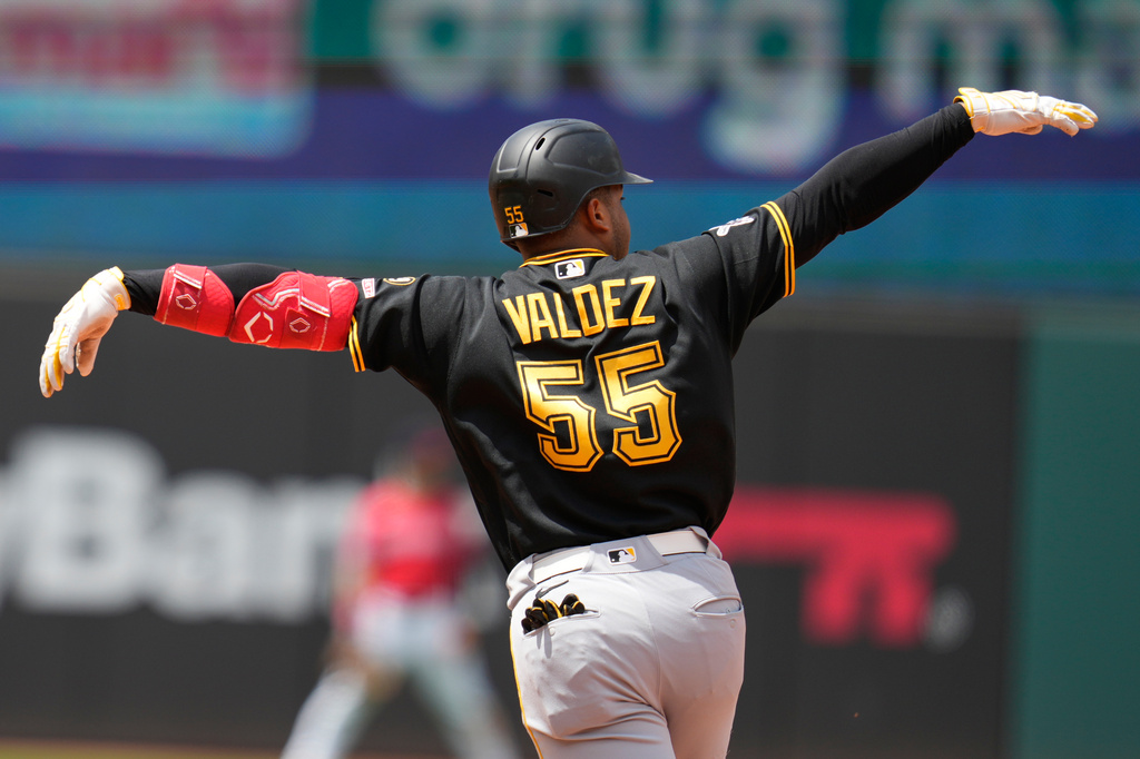 Pittsburgh Pirates' Esmerlyn Valdez gestures as he runs the bases with a home run in the sixth inning of the first baseball game of a split doubleheader against the Cleveland Guardians in Cleveland, Saturday, June 18, 2026. (AP Photo/Sue Ogrocki)