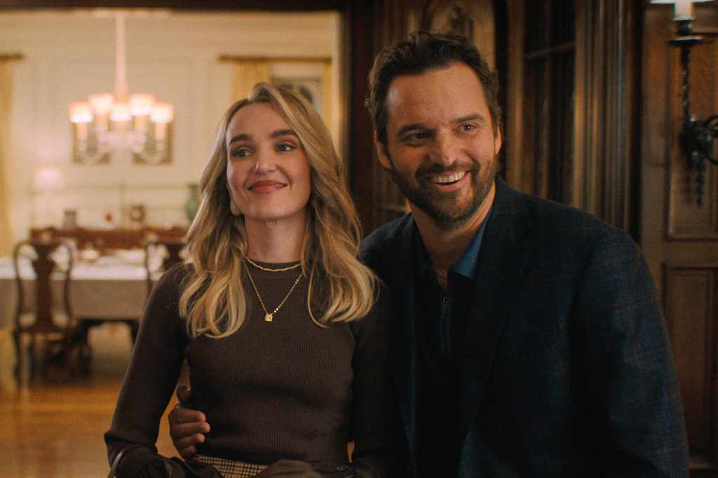 This image released by Apple TV shows Chloe Fineman, left, and Jake Johnson in a scene from "The DInk." (Andrew Cooper/Apple TV via AP)