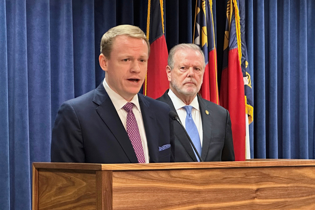 FILE - North Carolina state House Speaker Destin Hall, R-Caldwell, left, speaks while state Senate leader Phil Berger, R-Rockingham, listens during a news conference at the North Carolina Legislative Building in Raleigh, N.C., Sept. 11, 2025 (AP Photo/Gary D. Robertson, File)