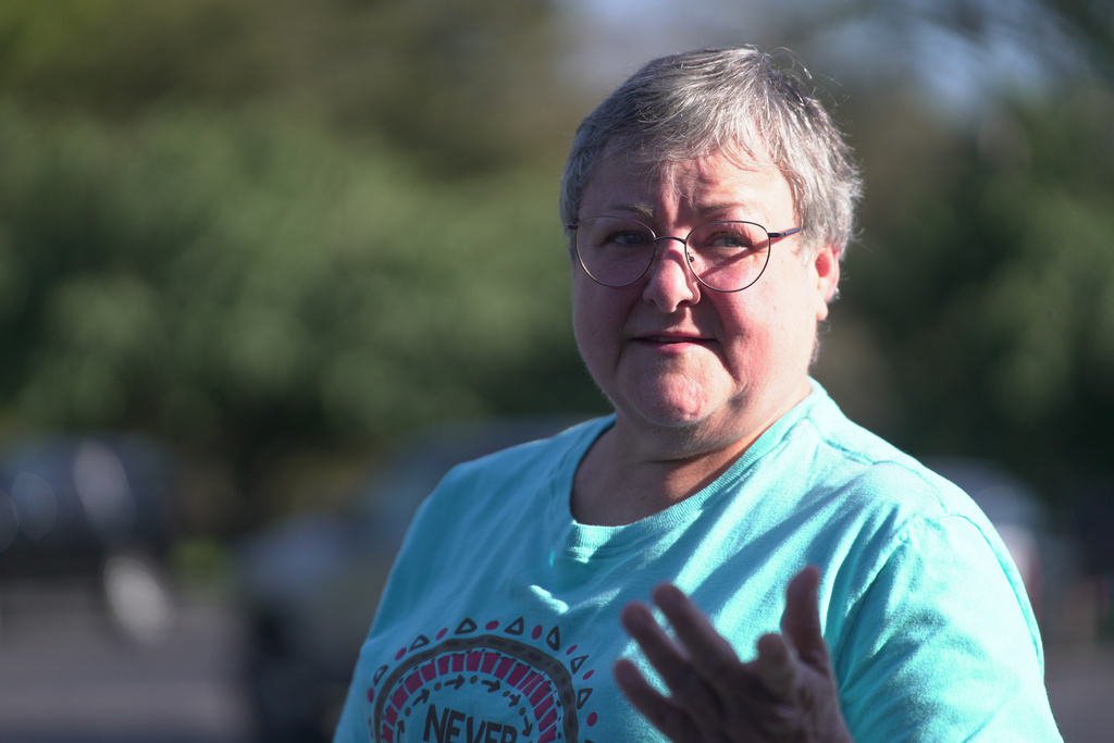 Janie Brown, 64, a resident of McEwen, Tenn. speaks to a journalist after the vigil held at Hurricane Chapel in McEwen, Tenn., on Saturday, Oct. 11, 2025, for victims of a blast that leveled an explosives plant. (AP Photo/Obed Lamy)