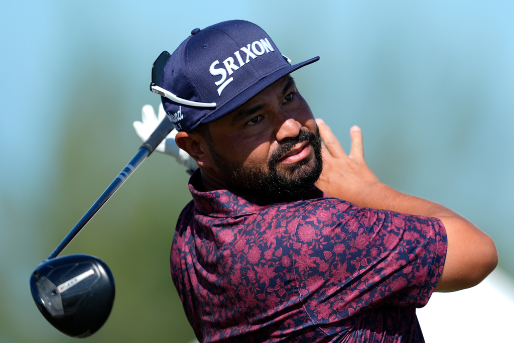 J.J. Spaun, of the United States, watches his tee shot on the fourth tee during the second round of the Hero World Challenge PGA Tour at the Albany Golf Club, in New Providence, Bahamas, Friday, Dec. 5, 2025. (AP Photo/Fernando Llano)