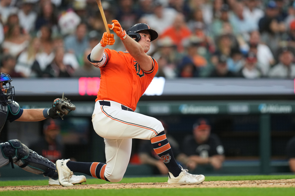 Detroit Tigers' Kerry Carpenter hits a two-run home run against the Seattle Mariners during the third inning of a baseball game Friday, June 5, 2026, in Detroit. (AP Photo/Paul Sancya)