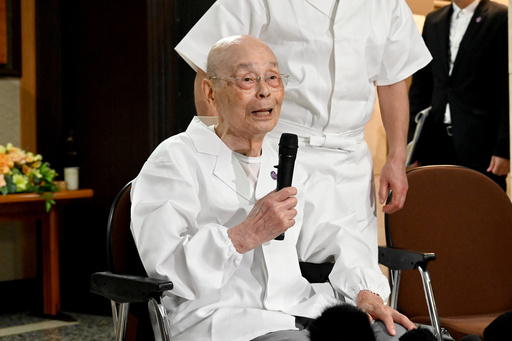 In this photo released by Bureau of Social Welfare, Tokyo Metropolitan Government, sushi legend Jiro Ono talks to reporters, who gathered in front of his restaurant to celebrate his 100th birthday in Tokyo, on Sept. 18, 2025. (Bureau of Social Welfare, Tokyo Metropolitan Government via AP) In this photo released by Bureau of Social Welfare, Tokyo Metropolitan Government, sushi legend Jiro Ono talks to reporters, who gathered in front of his restaurant to celebrate his 100th birthday in Tokyo, on Sept. 18, 2025. (Bureau of Social Welfare, Tokyo Metropolitan Government via AP)
