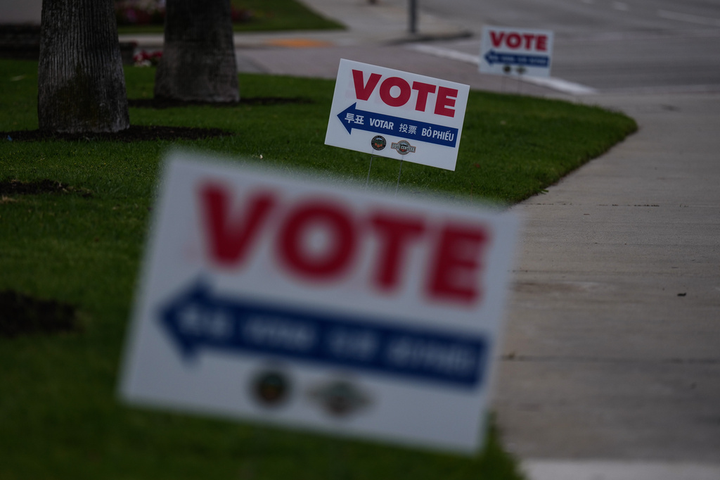 Vote signs are seen outside a vote center in La Habra, Calif., Tuesday, June 2, 2026. (AP Photo/Jae C. Hong)