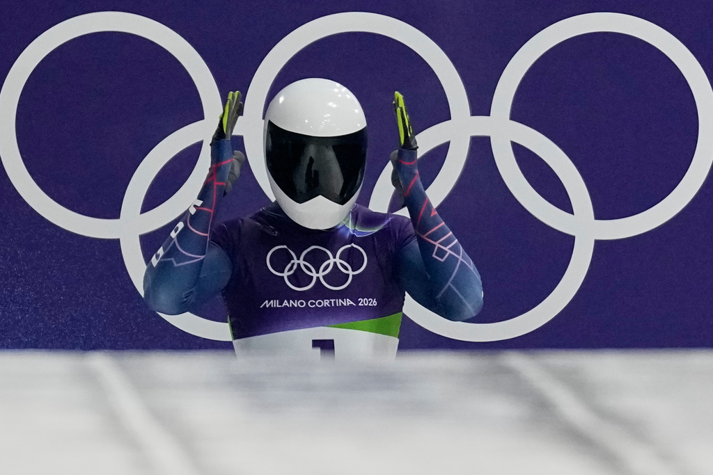Britain's Matt Weston prepares to start for a men's skeleton run at the 2026 Winter Olympics, in Cortina d'Ampezzo, Italy, Thursday, Feb. 12, 2026. (AP Photo/Aijaz Rahi)