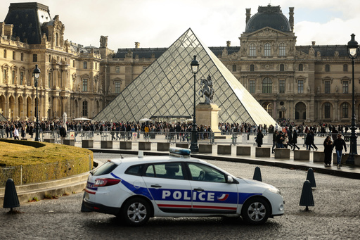 A police car parks in the courtyard of the Louvre museum, one week after the robbery, Sunday, Oct. 26, 2025 in Paris. The Paris prosecutor said on Sunday that a number of suspects have been arrested over the theft of crown jewels from Paris' Louvre museum last weekend. (AP Photo/Thomas Padilla) A police car parks in the courtyard of the Louvre museum, one week after the robbery, Sunday, Oct. 26, 2025 in Paris. The Paris prosecutor said on Sunday that a number of suspects have been arrested over the theft of crown jewels from Paris' Louvre museum last weekend. (AP Photo/Thomas Padilla)