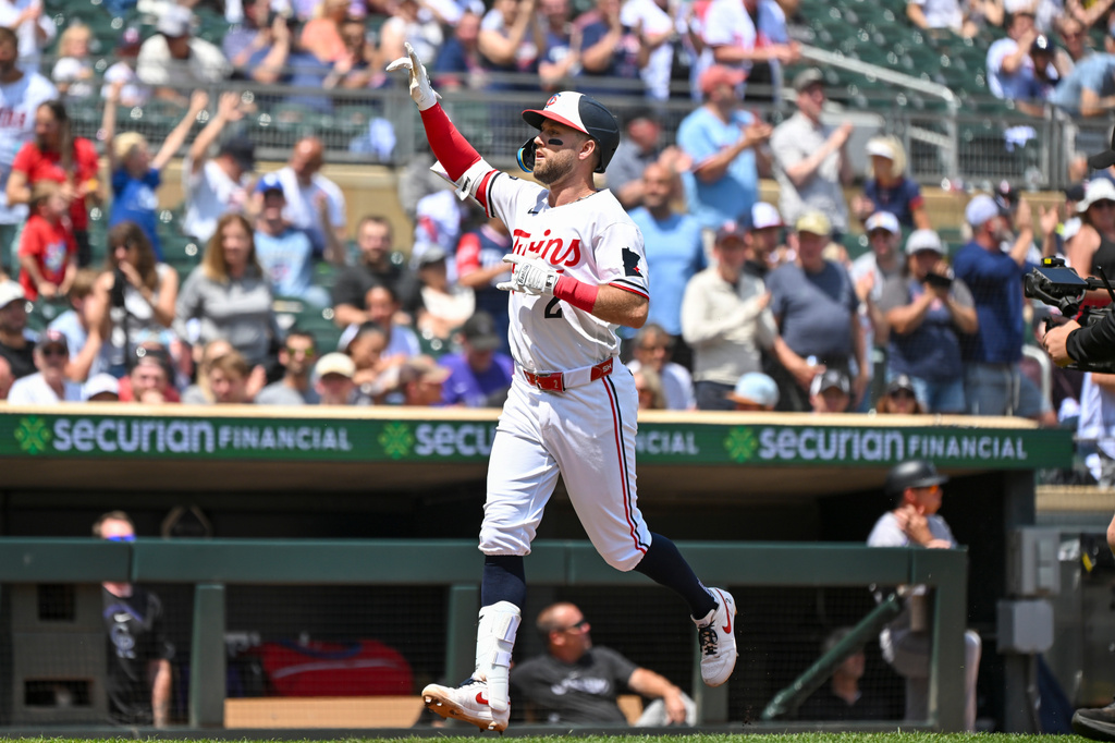 Minnesota Twins' Kody Clemens celebrates after hitting a home run against the Colorado Rockies during the fourth inning of a baseball game Sunday, June 28, 2026, in Minneapolis. (AP Photo/Craig Lassig)