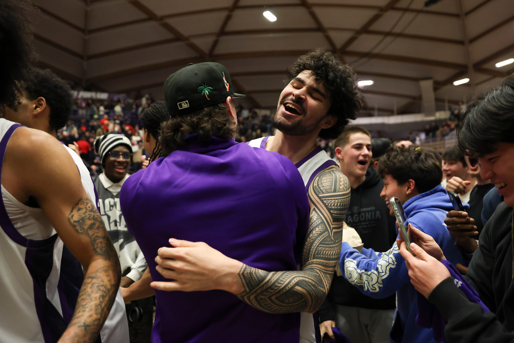 Portland forward Cameron Williams celebrates his team's win over Gonzaga following an NCAA college basketball game in Portland, Ore., Wednesday, Feb. 4, 2026. (AP Photo/Amanda Loman)