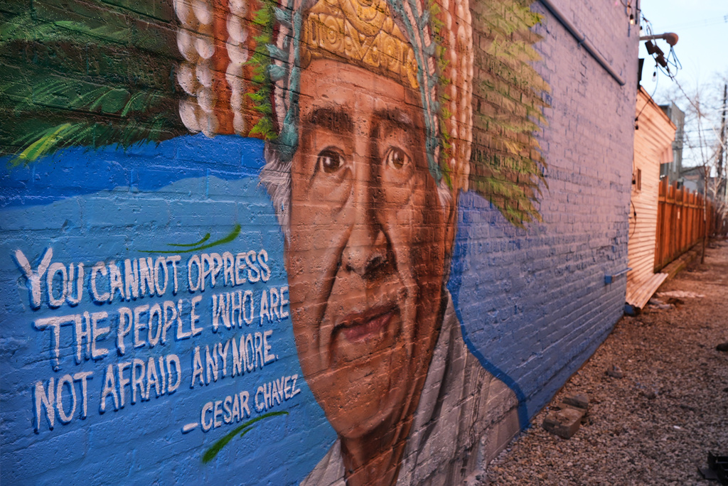FILE - A Cesar Chavez mural blankets the exterior of a building in Chicago, March 19, 2026. (AP Photo/Nam Y. Huh, File)