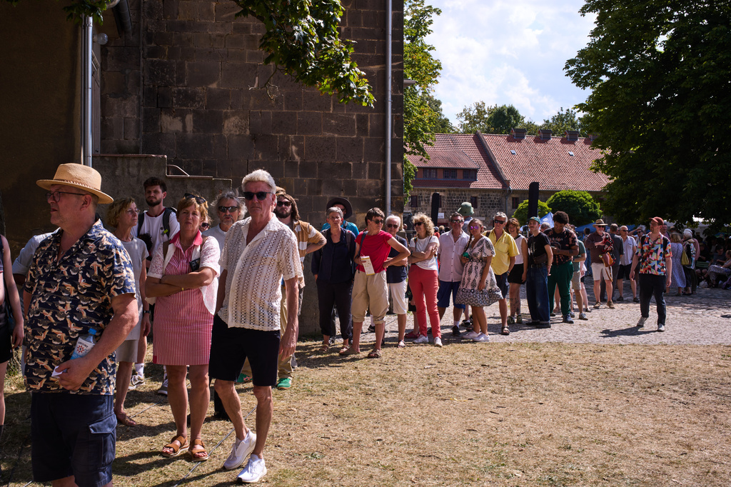 People line up at the Burchardi Church to listen to the new chord on the organ of the John Cage Organ Project in Halberstadt, Germany, Wednesday, Aug. 5, 2026. (AP Photo/Markus Schreiber)