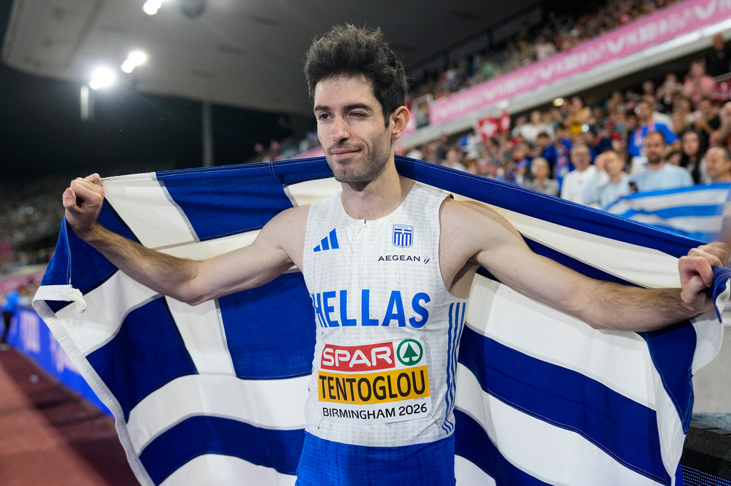 Greece's Miltiadis Tentoglou celebrates after winning the gold medal in the men's long jump final at the European Athletics Championships in Birmingham, England, Tuesday, Aug. 11, 2026. (AP Photo/Matthias Schrader)