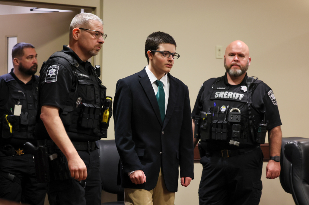 Colt Gray, the 16-year-old Apalachee High School shooting suspect, is led in by deputies for his sentencing after a short break at Barrow County Superior Court, Monday, July 27, 2026, in Winder, Ga. (Jason Getz/Atlanta Journal-Constitution via AP, Pool)