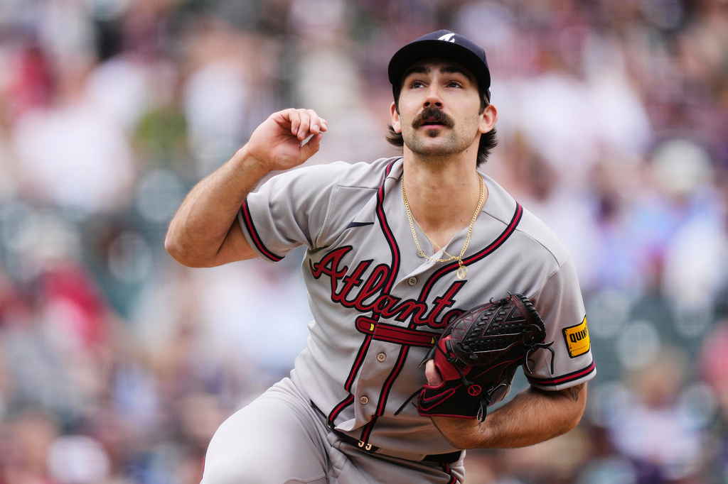 Atlanta Braves starting pitcher Spencer Strider works against the Colorado Rockies in the first inning of a baseball game Sunday, May 3, 2026, in Denver. (AP Photo/David Zalubowski)