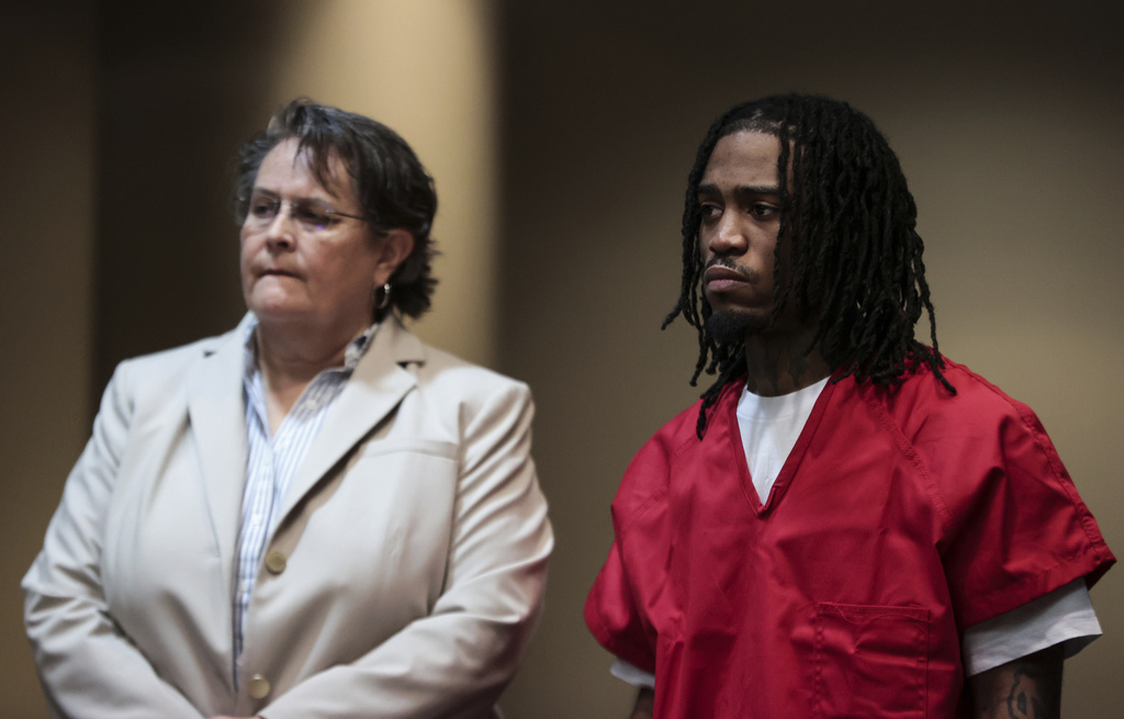 Ezekiel Kelly stands with his attorney after pleading guilty in court on Tuesday, Aug. 13, 2025 in Memphis, Tenn. (Patrick Lantrip /Daily Memphian via AP)