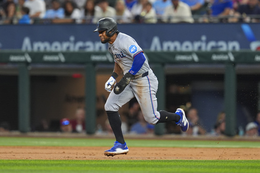 Miami Marlins' Otto Lopez steals second base during the second inning of a baseball game against the Texas Rangers on Sunday, Sept. 21, 2025, in Arlington, Texas. (AP Photo/Ronaldo Bolaños) Miami Marlins' Otto Lopez steals second base during the second inning of a baseball game against the Texas Rangers on Sunday, Sept. 21, 2025, in Arlington, Texas. (AP Photo/Ronaldo Bolaños)