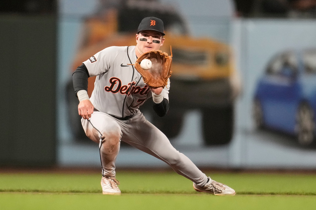 Detroit Tigers third baseman Kevin McGonigle catches a line out hit into by San Francisco Giants' Christian Koss during the sixth inning of a baseball game, Friday, Aug. 7, 2026, in San Francisco. (AP Photo/Jeff Chiu)