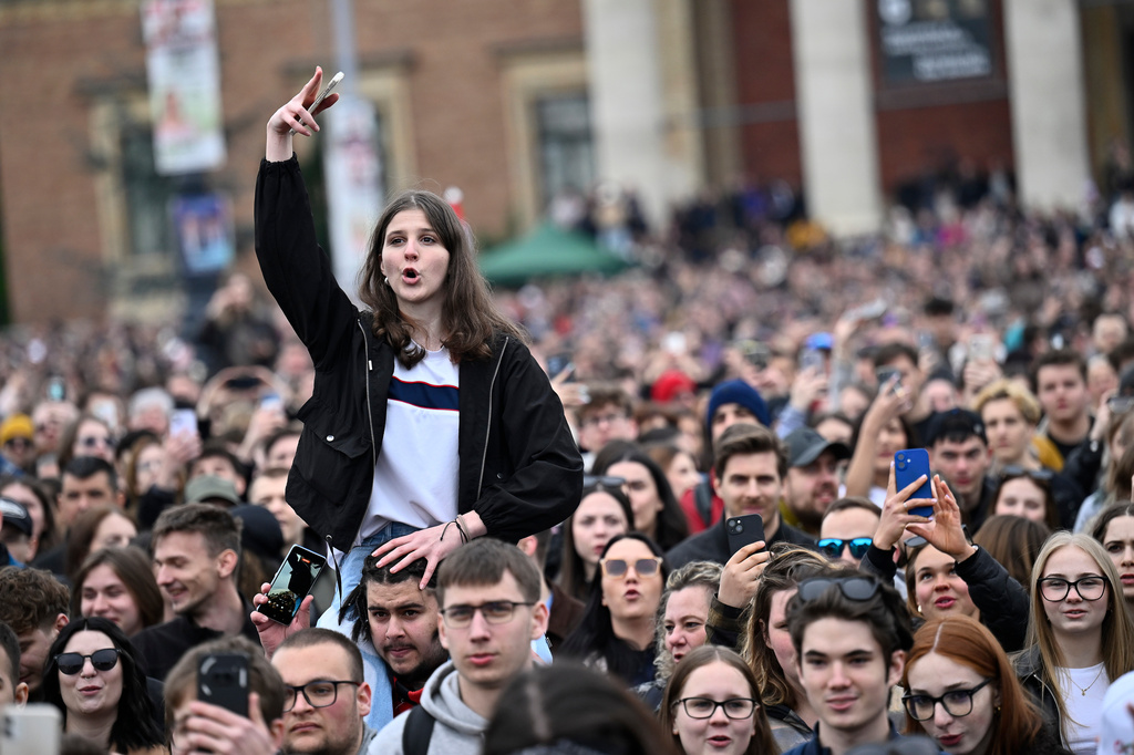 People react during an anti-government concert featuring dozens of the country's most popular performers in Budapest, Hungary, on Friday, April 10, 2026. (AP Photo/Denes Erdos)