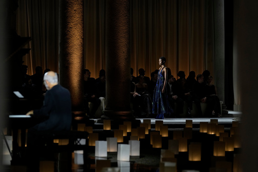 A model wears a creation as part of the Giorgio Armani Spring/Summer 2026 collection show in Milan, Italy, Sunday, Sept. 28, 2025. (AP Photo/Luca Bruno) A model wears a creation as part of the Giorgio Armani Spring/Summer 2026 collection show in Milan, Italy, Sunday, Sept. 28, 2025. (AP Photo/Luca Bruno)