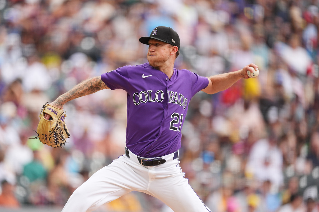 Colorado Rockies starting pitcher Kyle Freeland works against the Milwaukee Brewers in the fifth inning of a baseball game Sunday, June 7, 2026, in Denver. (AP Photo/David Zalubowski)