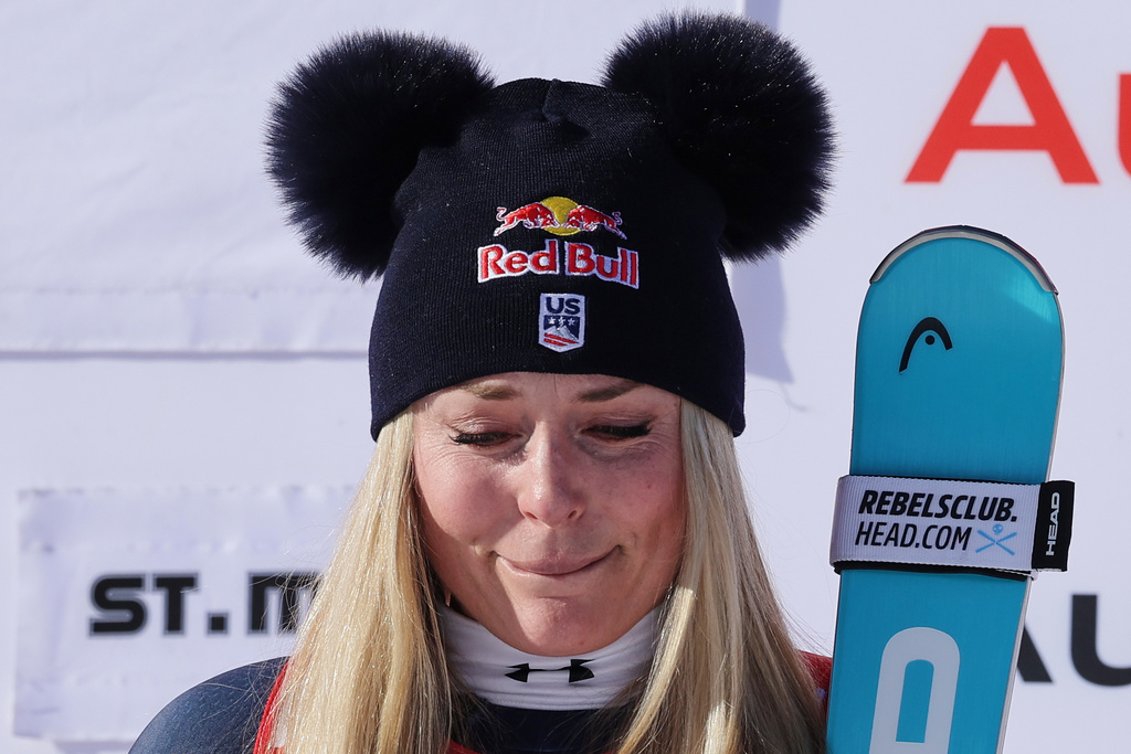 United States' Lindsey Vonn gets emotional as she celebrates winning an alpine ski, women's World Cup downhill, in St. Moritz, Switzerland, Friday Dec. 12, 2025. (AP Photo/Luciano Bisi)
