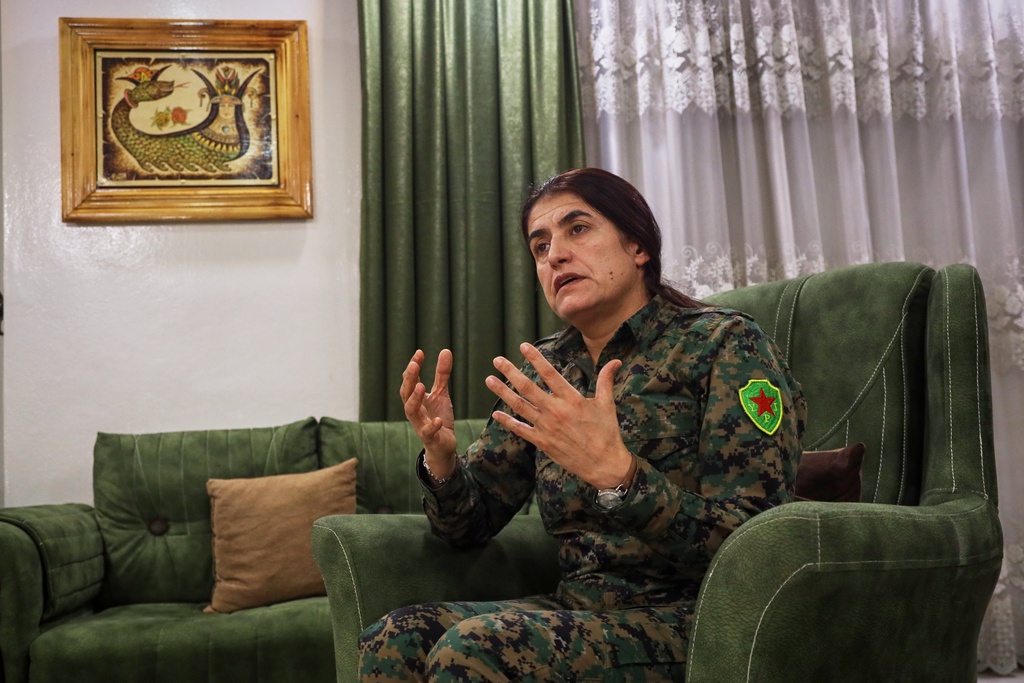 Rohlat Afrin, commander of the Syrian Democratic Forces (SDF) Women's Protection Units, talks with The Associated Press in Qamishli, Syria, Saturday, Jan. 31, 2026. (AP Photo/Baderkhan Ahmad)