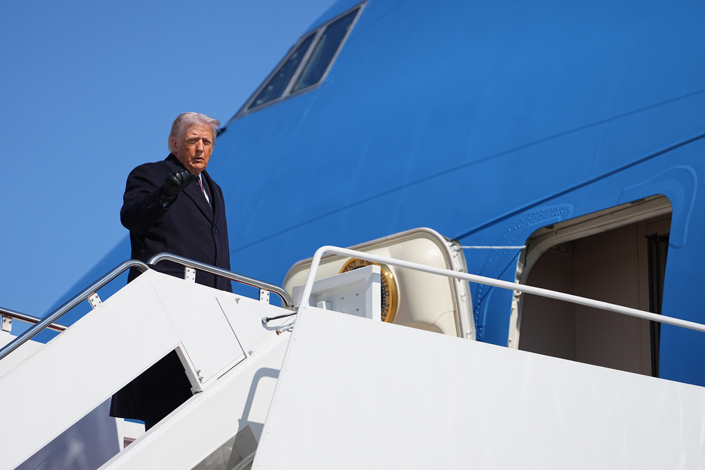 President Donald Trump boards Air Force One at Joint Base Andrews, Md., Friday, Feb. 27, 2026, en route Corpus Christi, Texas. (AP Photo/Matt Rourke)