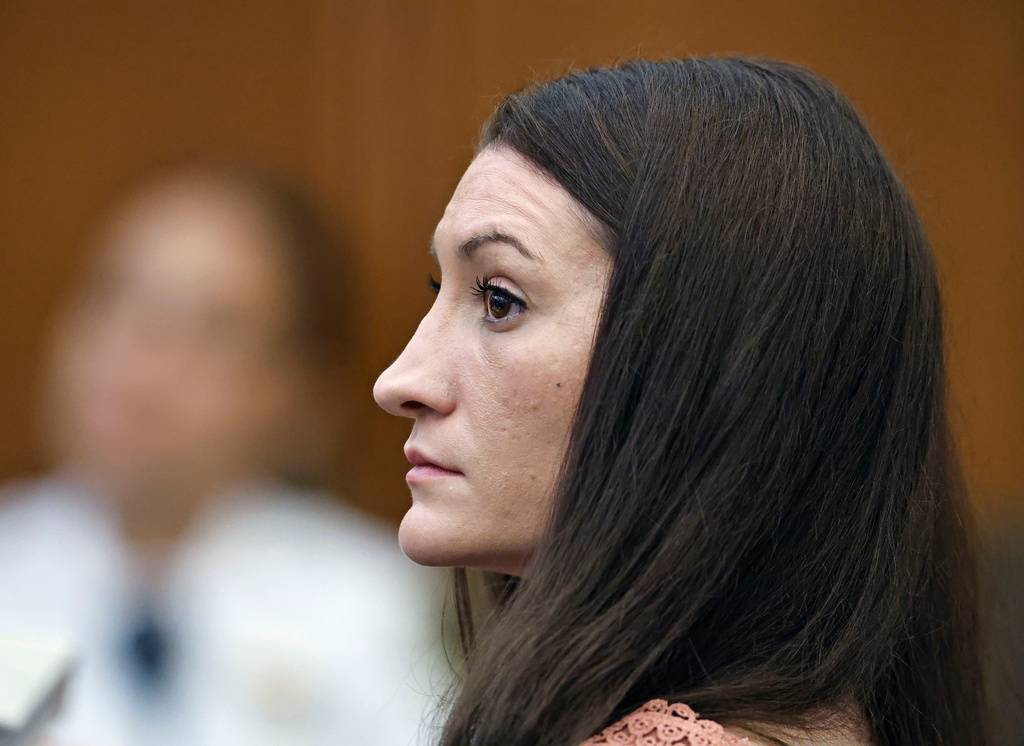 Lindsay Clancy listens to a witness on video during her murder trial at Plymouth Superior Court, Monday, Aug. 24, 2026 in Plymouth, Mass. (Greg Derr/The Patriot Ledger via AP, Pool)