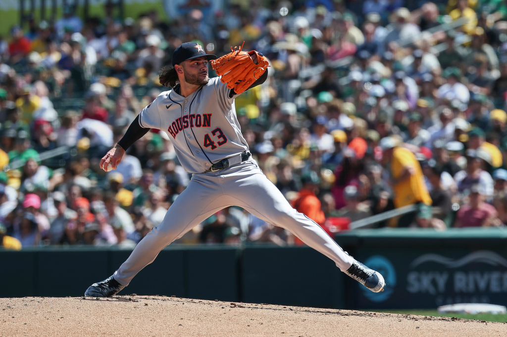 Houston Astros pitcher Lance McCullers Jr. throws to the Athletics during the second inning of a baseball game, Sunday, April 5, 2026, in West Sacramento, Calif. (AP Photo/Sara Nevis)