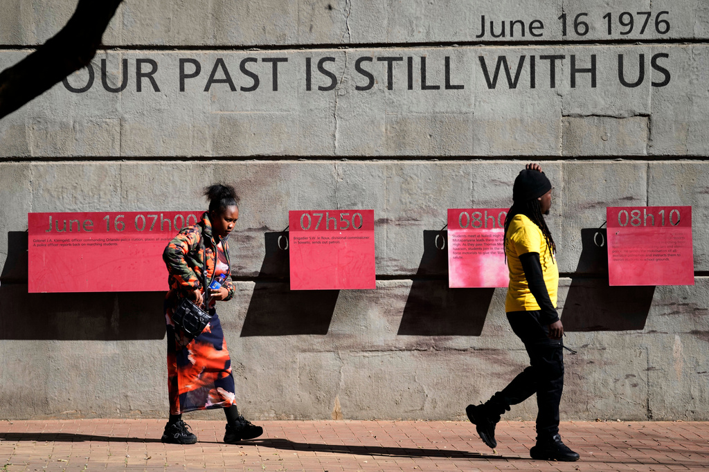 Youth visit the June 16 Memorial Acre, in Soweto, South Africa, Monday, June 15, 2026. (AP Photo/Themba Hadebe)
