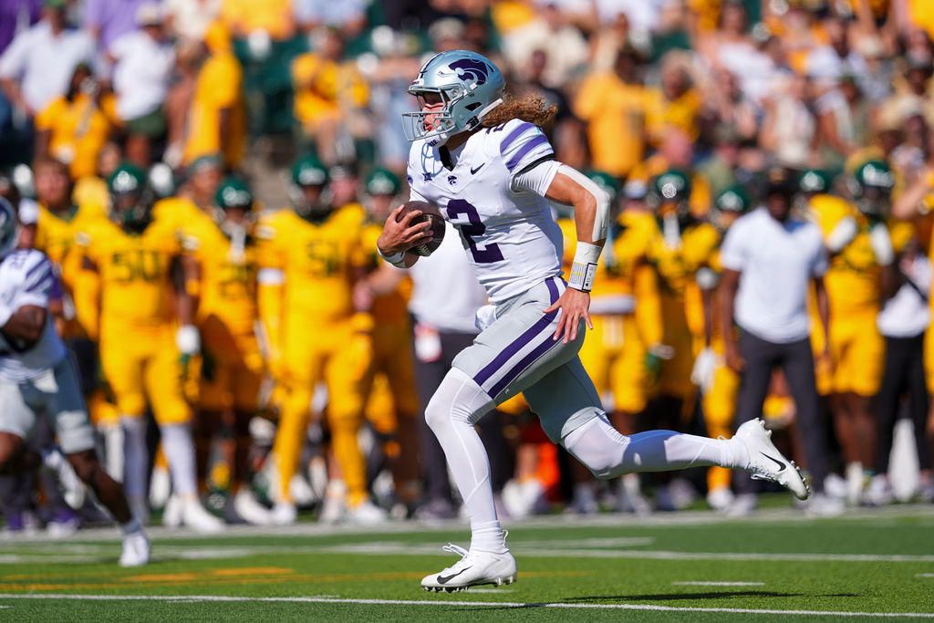 Kansas State quarterback Avery Johnson (2) rushes down the field for a touchdown during the first half of an NCAA college football game against Baylor, Saturday, Oct. 4, 2025, in Waco, Texas. (AP Photo/Ronaldo Bolaños))