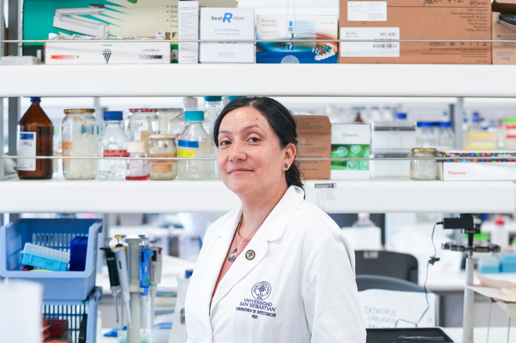 María Inés Barría, a virologist at the Universidad San Sebastián, poses for a picture at the university in Santiago, Chile, Wednesday, May 20, 2026. (AP Photo/Esteban Felix)
