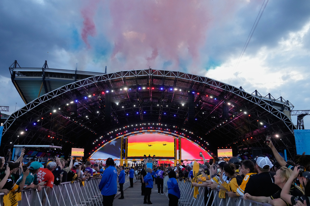 Fireworks explode over the draft stage before the first round of the NFL football draft, Thursday, April 23, 2026, in Pittsburgh. (AP Photo/Sue Ogrocki)