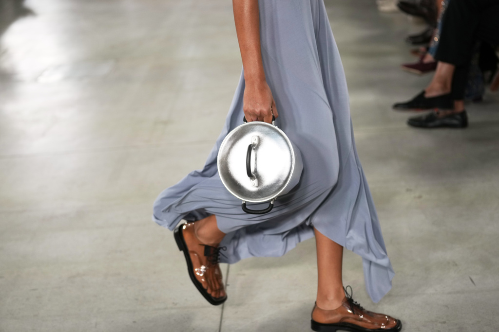 A model wears a creation part of the Moschino women's Spring-Summer 2026 collection, presented in Milan, Italy, Thursday, Sept. 25, 2025. (AP Photo/Antonio Calanni)