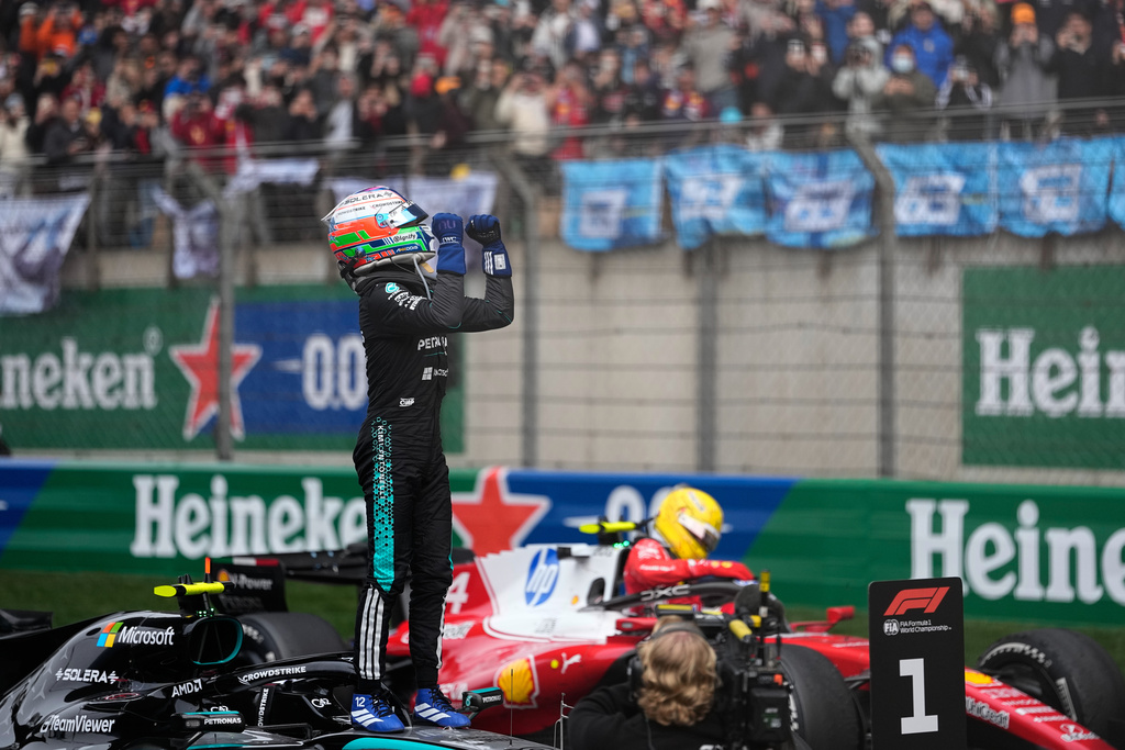 Mercedes driver Andrea Kimi Antonelli of Italy celebrates after he clocked the fastest time in the Chinese Formula One Grand Prix race at the Shanghai International Circuit, in Shanghai, China, Sunday, March 15, 2026. (AP Photo/Andy Wong)