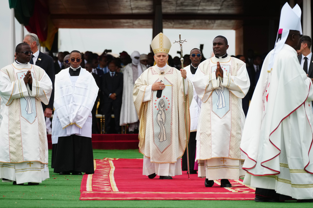 Pope Leo XIV arrives in procession to celebrate Mass at Yaounde Ville Airport, Cameroon, Saturday, April 18, 2026 on the sixth day of his 11-day pastoral visit to Africa. (AP Photo/Andrew Medichini)