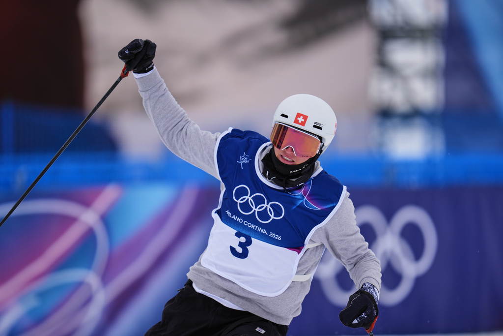 Switzerland's Andri Ragettli celebrates his run during the men's freestyle skiing slopestyle finals at the 2026 Winter Olympics, in Livigno, Italy, Tuesday, Feb. 10, 2026. (AP Photo/Abbie Parr)
