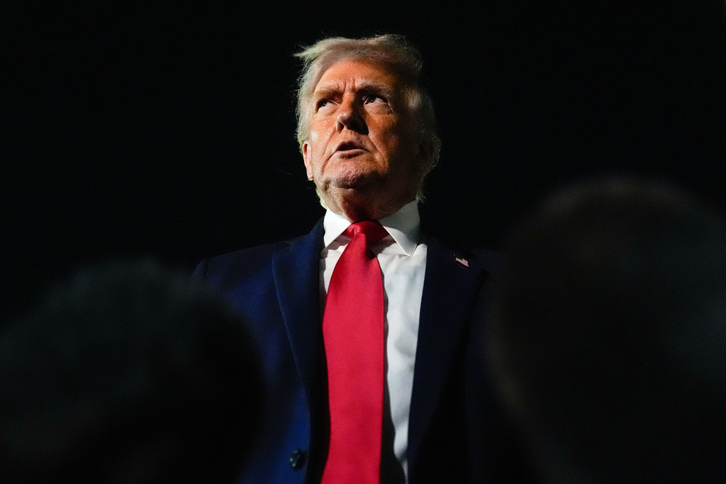 President Donald Trump speaks with reporters after arriving at Palm Beach International Airport, Monday, Jan. 19, 2026, in West Palm Beach, Fla. (AP Photo/Julia Demaree Nikhinson)