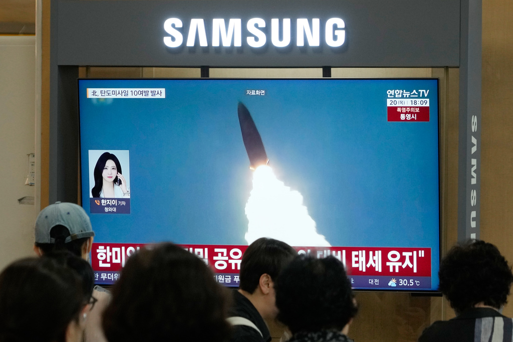 A TV screen shows a file image of North Korea's missile launch during a news program at Seoul Railway Station in Seoul, South Korea, Thursday, Aug. 20, 2026. (AP Photo/Ahn Young-joon)