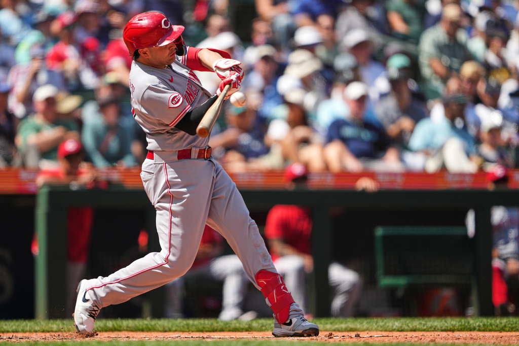 Cincinnati Reds' Sal Stewart hits a three-run home run against the Seattle Mariners during the seventh inning of a baseball game, Wednesday, July 22, 2026, in Seattle. (AP Photo/Lindsey Wasson)