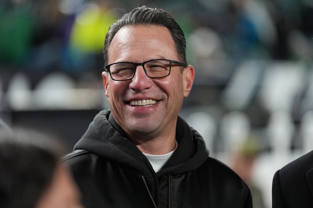 FILE - Pennsylvania Gov. Josh Shapiro watches warm ups before an NFL football game between the Philadelphia Eagles and the Detroit Lions on Sunday, Nov. 16, 2025, in Philadelphia. (AP Photo/Matt Slocum, File)