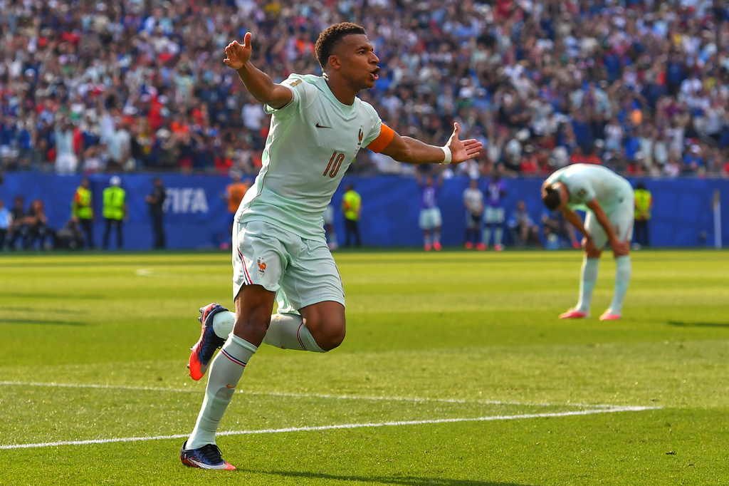France's Kylian Mbappe (10) celebrates scoring the opening goal during the World Cup quarterfinal soccer match between France and Morocco in Foxborough, Mass., near Boston, Thursday, July 9, 2026. (AP Photo/Steven Senne)