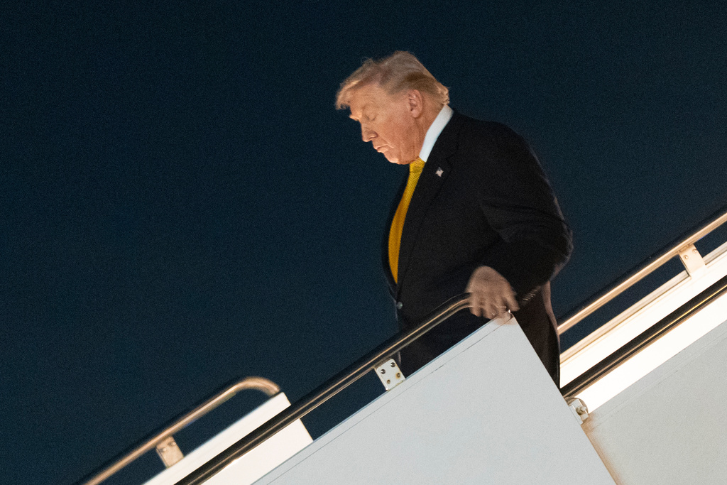 President Donald Trump arrives Palm Beach International Airport in West Palm Beach, Fla., on Air Force One, for a weekend trip at his Mar-a-Lago estate in Palm Beach, Fla., Friday, Nov. 7, 2025. (AP Photo/Manuel Balce Ceneta)