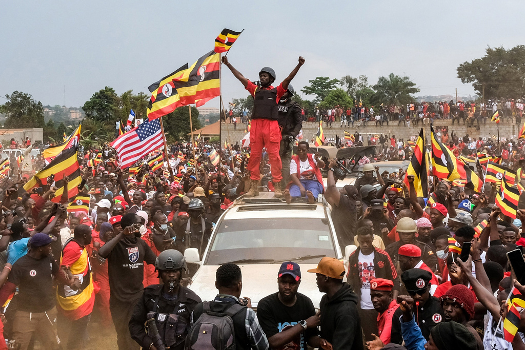 Uganda opposition presidential candidate Robert Kyagulanyi Ssentamu who is known as Bobi Wine waves to supporters at an election campaign rally in Mukono, Uganda, Friday, Jan. 9, 2026. (AP Photo/Hajarah Nalwadda)