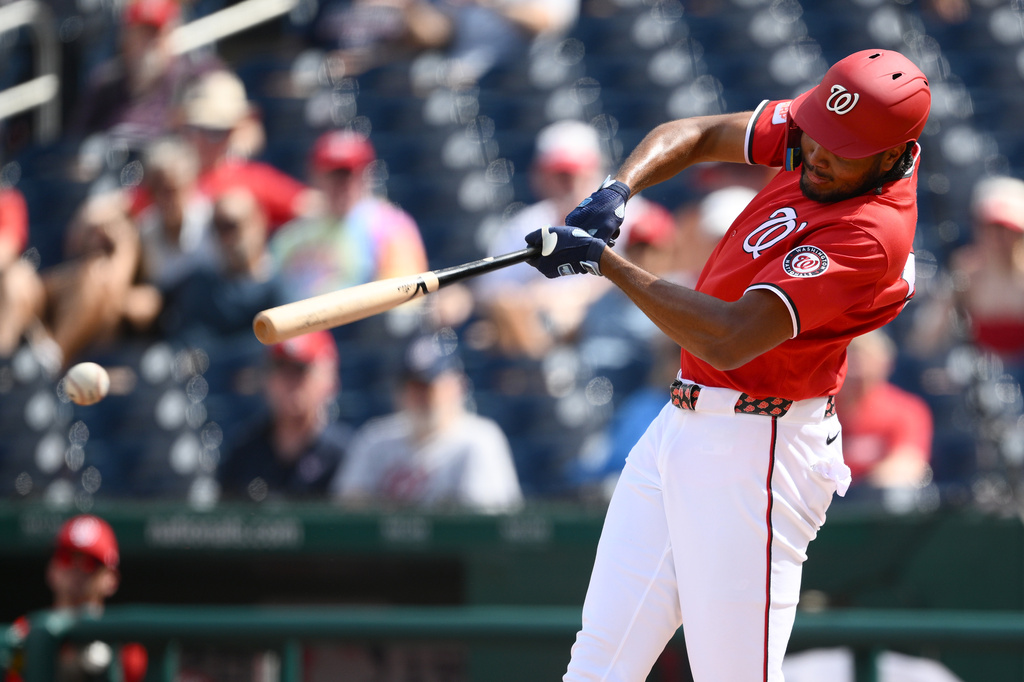 Washington Nationals' James Wood singles during the third inning of a baseball game against the Los Angeles Angels, Sunday, Sept. 13, 2026, in Washington. (AP Photo/Nick Wass)