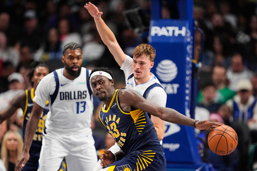 Indiana Pacers forward Pascal Siakam (43) loses control of the ball as Dallas Mavericks' Cooper Flagg defends in the second half of an NBA basketball game Wednesday, Oct. 29, 2025, in Dallas. (AP Photo/Tony Gutierrez) Indiana Pacers forward Pascal Siakam (43) loses control of the ball as Dallas Mavericks' Cooper Flagg defends in the second half of an NBA basketball game Wednesday, Oct. 29, 2025, in Dallas. (AP Photo/Tony Gutierrez)